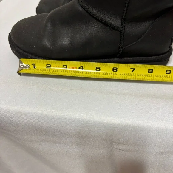 UGG Classic Short Leather Boots in black. - Picture 9 of 9